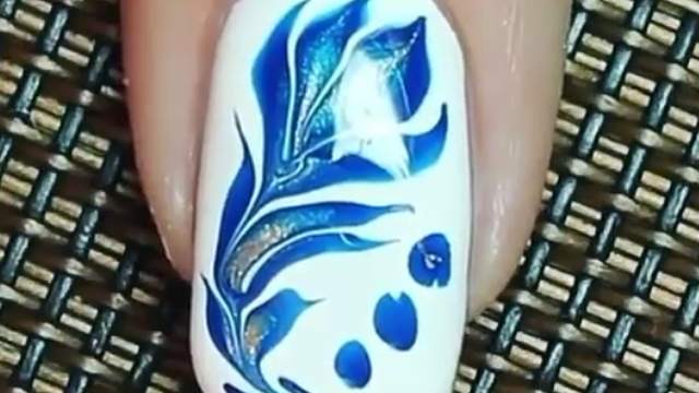 طراحی ناخن گل آبی